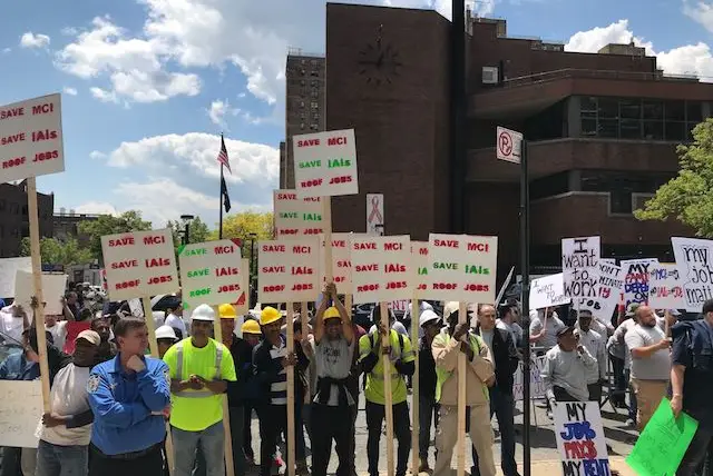 Contractors showed up to protest a hearing in May on rent reform at Medger Evers College.
